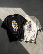 Big D Bear playeras negra y blanca flat lay - Nostalgia Lab